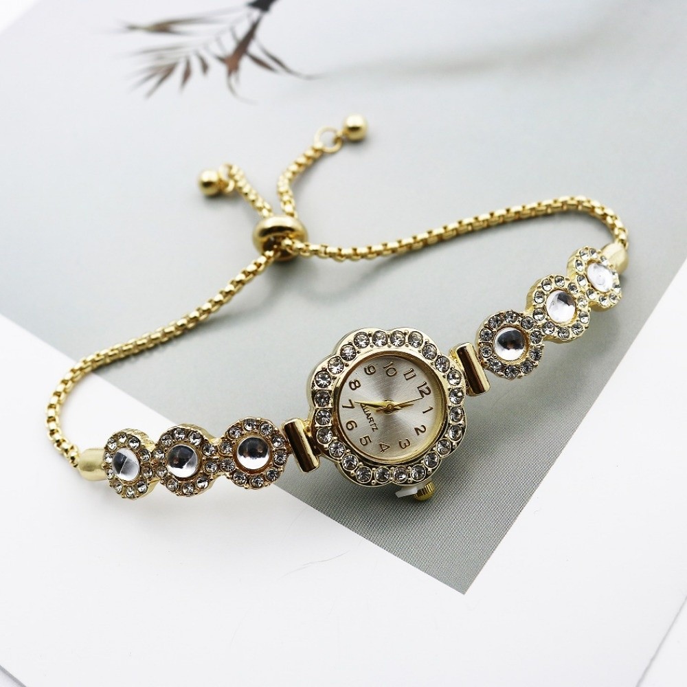 ファッションラインストーン女性クォーツ時計花ハート型ブレスレ - Open Heart Watch のレビューと価格